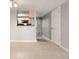 An open-concept living space features tile floors, fresh paint, and easy access to the kitchen at 6114 Peregrine Ave # D03, Orlando, FL 32819