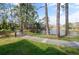 A beautiful walkway meanders alongside a peaceful pond at 6114 Peregrine Ave # D03, Orlando, FL 32819