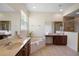 Bright main bathroom featuring a soaking tub, double vanities, and a separate shower at 7299 Vista Park Blvd, Orlando, FL 32829