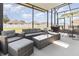 The patio has outdoor seating, a glass table, and a grill at 9731 Pepper Tree Trl, Wildwood, FL 34785