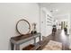 Welcoming entryway with hardwood floors, decorative accents, and bright, neutral walls at 1025 Augustus Dr, Davenport, FL 33896