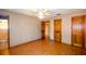 This bedroom features sleek hardwood floors and a ceiling fan for added comfort at 1062 Stillwater Ave, Deltona, FL 32725