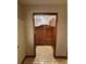 Hallway view featuring swinging wood doors leading to another room at 1062 Stillwater Ave, Deltona, FL 32725