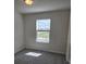 Comfortable carpeted bedroom with a window and natural light at 11151 Rising Sun St, Orlando, FL 32829