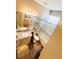 Bathroom featuring double sinks, granite countertops, dark wood floors, and a tiled shower at 14339 Windchime Ln, Orlando, FL 32837