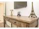 Living room showing decorative table with lamps and an Eiffel Tower replica at 1555 Flange Dr, Davenport, FL 33896