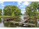 Scenic view of a community dock providing access to the water, perfect for boating and recreation at 162 Lago Vista Blvd, Casselberry, FL 32707