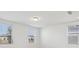 Light filled bedroom with large windows and blinds at 16450 Bird Of Paradise Ave, Clermont, FL 34714