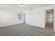 Light-filled bedroom with carpet and a neutral color scheme at 16450 Bird Of Paradise Ave, Clermont, FL 34714