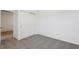 Bedroom featuring a closet, ensuite bath, and neutral carpet at 16450 Bird Of Paradise Ave, Clermont, FL 34714