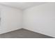 This bedroom features a neutral carpet and a window for natural light at 16450 Bird Of Paradise Ave, Clermont, FL 34714