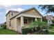 Charming home featuring a covered front porch with columns and well-maintained landscaping at 16749 Harper Cove Dr, Winter Garden, FL 34787