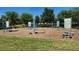 Outdoor fitness park features various exercise stations and equipment on a mulch base, promoting active living in the community at 16749 Harper Cove Dr, Winter Garden, FL 34787