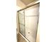 Shower stall featuring a sliding glass door and tiled walls at 16749 Harper Cove Dr, Winter Garden, FL 34787