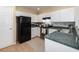 Cozy kitchen featuring white cabinets, ample counter space, and modern appliances at 1709 Winter Green Blvd, Winter Park, FL 32792