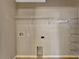 A laundry room featuring wire shelving for easy storage at 2005 E Grant Ave, Orlando, FL 32806
