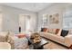 Bright living room features stylish seating, modern decor, and hardwood floors at 2005 E Grant Ave, Orlando, FL 32806