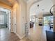 Inviting foyer showcasing arched doorways, neutral paint, tiled floors and views of the dining and living area at 228 Bayou Bend Rd, Groveland, FL 34736