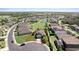 Aerial view of the single-Gathering home with manicured lawn highlighted with a red boundary line at 2319 Grantham Ave, Davenport, FL 33837