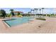 Gathering-friendly splash pool with waterslides, umbrellas, and poolside seating area at 2319 Grantham Ave, Davenport, FL 33837