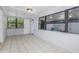 Bright and spacious bonus room with tile floors, neutral walls, and multiple windows for ample natural light at 2429 Yale Ave, Sanford, FL 32771