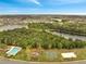 Great aerial view of the neighborhood, lake, pool, playground and sand volleyball court at 2906 Clarabelle Ct, Kissimmee, FL 34743