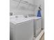 Bright laundry room with washer and dryer at 310 Pendant Ct, Kissimmee, FL 34747