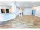 Large open living area with sleek flooring at 3209 Hanley St, Deltona, FL 32738