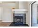 Stylish living room featuring a black-tiled fireplace and natural light at 413 Mainsail Ct, Lake Mary, FL 32746