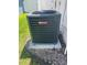 Exterior shot of a Goodman air conditioner on concrete slab at 6037 Hickory Grove Ln, Port Orange, FL 32128