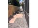 A backyard walkway with flowers and privacy fence at 6037 Hickory Grove Ln, Port Orange, FL 32128