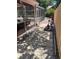 Landscaped backyard with walkway, a serene environment with pool access at 6037 Hickory Grove Ln, Port Orange, FL 32128