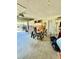 A two car garage with a workbench, storage and access door at 6037 Hickory Grove Ln, Port Orange, FL 32128
