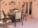 Outdoor patio area with seating, beach themed decorations and pink painted concrete floor at 6037 Hickory Grove Ln, Port Orange, FL 32128