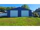 Large, detached two-door garage, perfect for storage or hobbies at 604 Missouri Ave, St Cloud, FL 34769