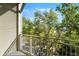 Enjoy beautiful treetop views from the home's private balcony at 604 Mulberry Ave # 1201, Kissimmee, FL 34747