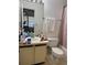 Functional bathroom features a sink, toilet, and shower/tub combination at 6142 Westgate Dr # 304, Orlando, FL 32835