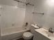 Well-lit bathroom with a standard tub/shower combo and white fixtures at 6142 Westgate Dr # 304, Orlando, FL 32835