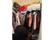 Overstuffed closet with assorted clothes and shoes at 6142 Westgate Dr # 304, Orlando, FL 32835