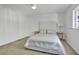 Cozy bedroom featuring a comfortable bed, simple decor, and a closet at 700 Melrose Ave # L-23, Winter Park, FL 32789