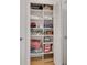 Organized closet with ample shelving and storage for various items at 700 Melrose Ave # L-23, Winter Park, FL 32789