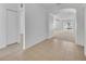 Bright foyer featuring neutral paint, archways, and tile flooring that leads into the spacious carpeted living areas at 7219 Rafanelli Ct, Orlando, FL 32818