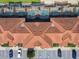 Overhead shot featuring pools and multiple units, highlighting well-manicured landscaping and convenient parking at 8845 Candy Palm Rd, Kissimmee, FL 34747