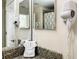 Bathroom features granite countertop, decorative hand towel and mounted hairdryer at 8845 Candy Palm Rd, Kissimmee, FL 34747