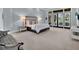 Spacious main bedroom with large windows offering ample natural light and an exterior view at 9372 Thurloe Pl, Orlando, FL 32827