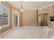 Dining room with tile flooring and a view of the backyard at 9548 Crown Prince Ln, Windermere, FL 34786