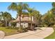 Elegant home with manicured landscaping, a circular driveway, and a spacious two-car garage at 1185 Cypress Loft Pl, Lake Mary, FL 32746