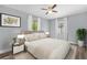 Cozy bedroom featuring a large bed, neutral tones, and plenty of natural light at 1259 Freeport Dr, Deltona, FL 32725