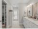 Hallway to bathroom features closet and storage space, a marble countertop and backyard access at 1285 Seminole Ave, Longwood, FL 32750