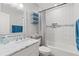 Bright bathroom with a bathtub and tiled shower at 1285 Seminole Ave, Longwood, FL 32750